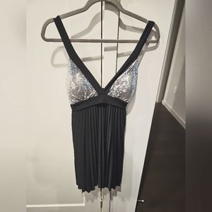 Black dress with silver sequins. Large. Never worn. No tags but like new.